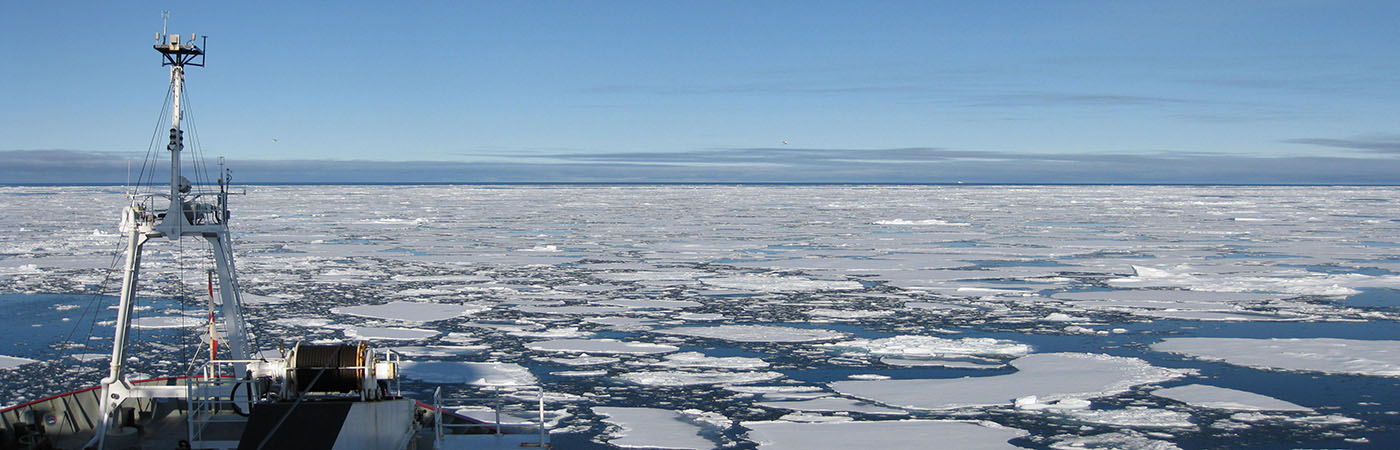 Research vessel negotiating pancake ice in the Arctic Ocean