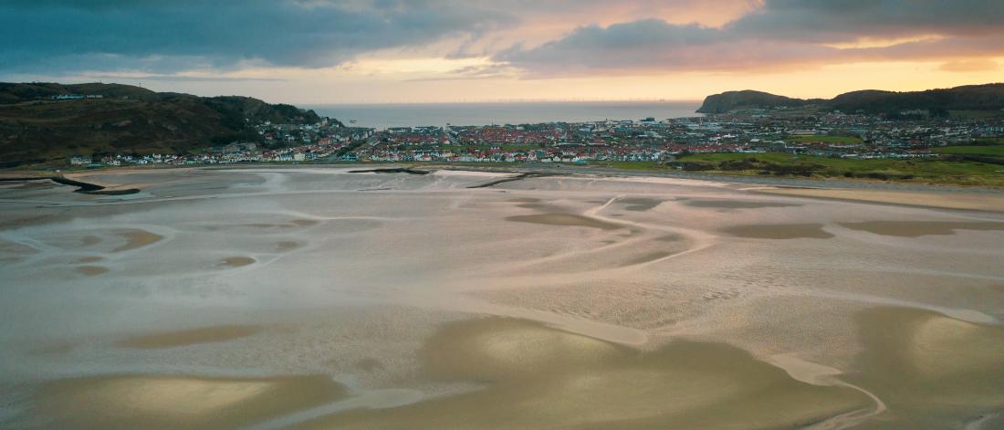  sandbanks and channels can be seen in this low tide aerial view taken above the coast looking towards West Shore, Llandudno
