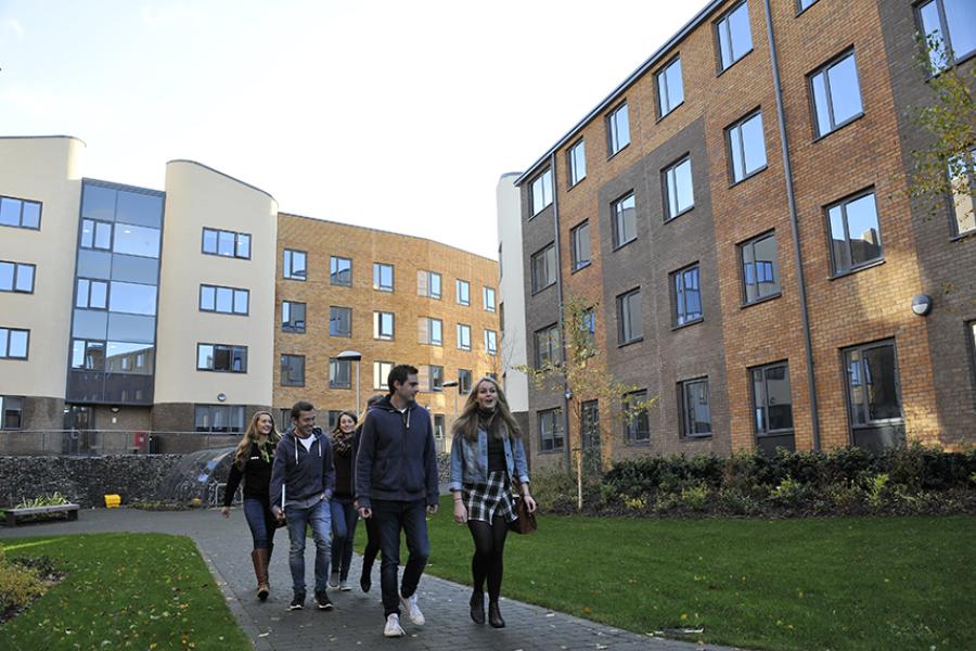 Acccommodation - students walking through St Mary's Student Village