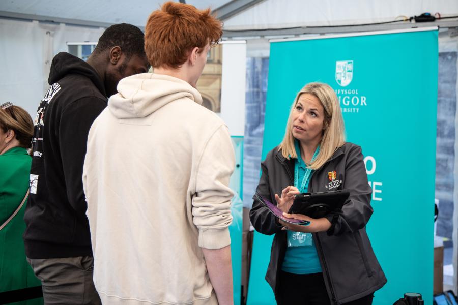 Bangor University Staff welcoming prospective students at an Open Day