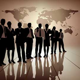 silhouette of businessmen and women in fromt of a world map
