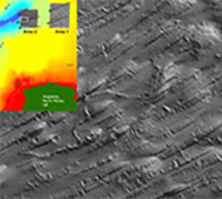 Drumlins, eskers and many iceberg scour marks on the seafloor off Anglesey, marking ice stream advance and retreat