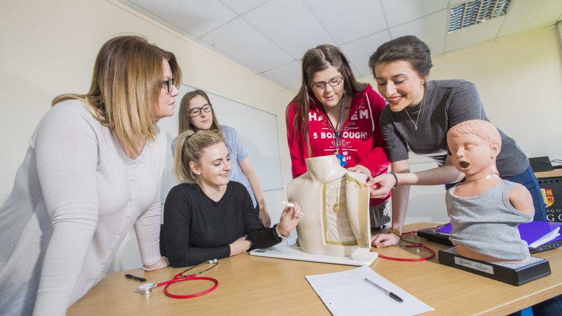 Nursing students in a practical session.