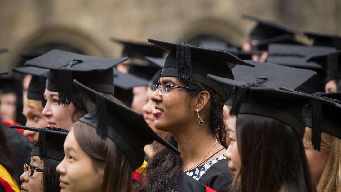 Students in their cap and gown at the graduation ceremony