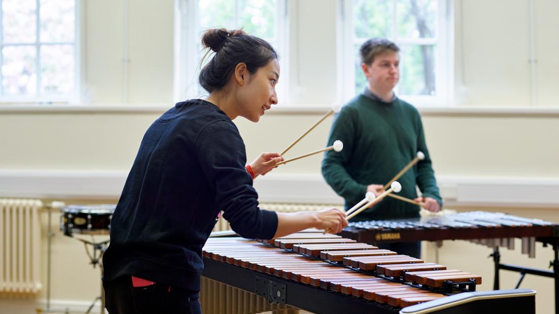 Students playing musical instruments