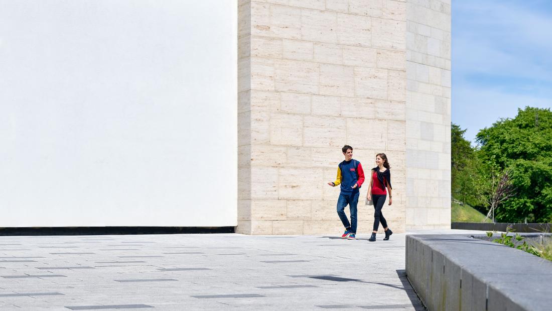 Students walking past the Pontio building