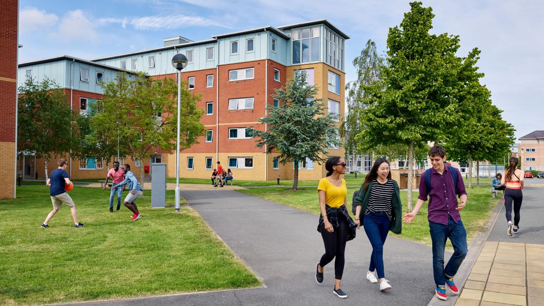 Students walking through Ffriddoedd Student Accommodation