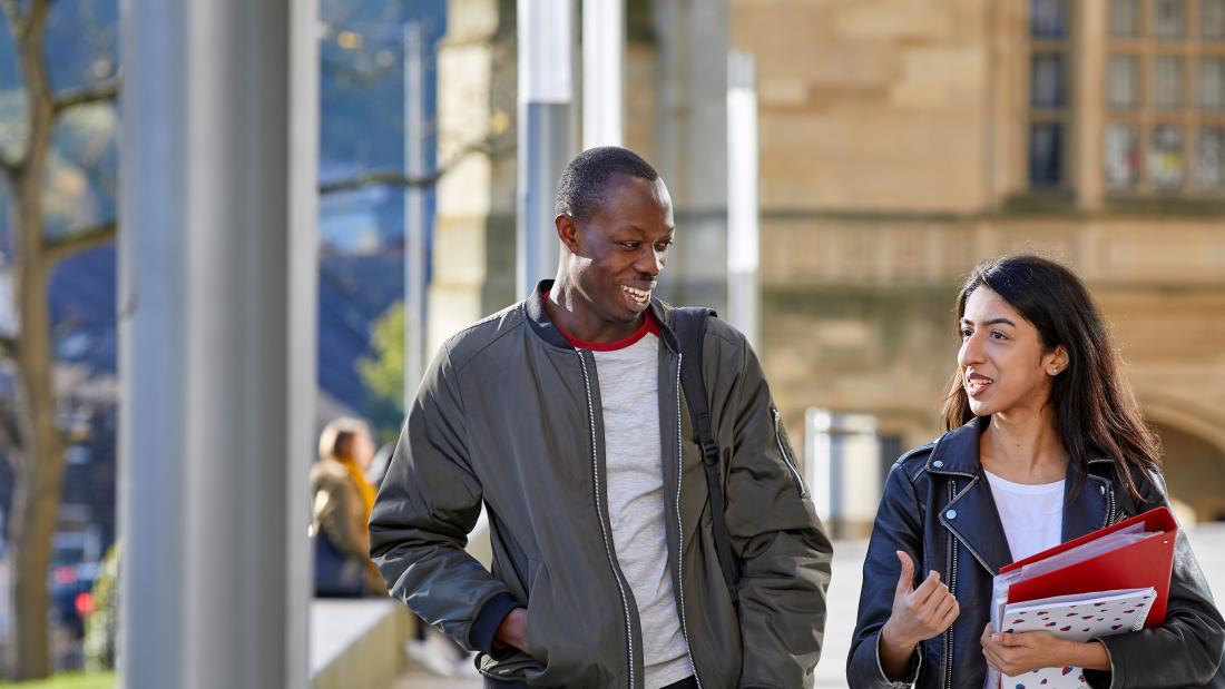 A couple of students walking between lectures