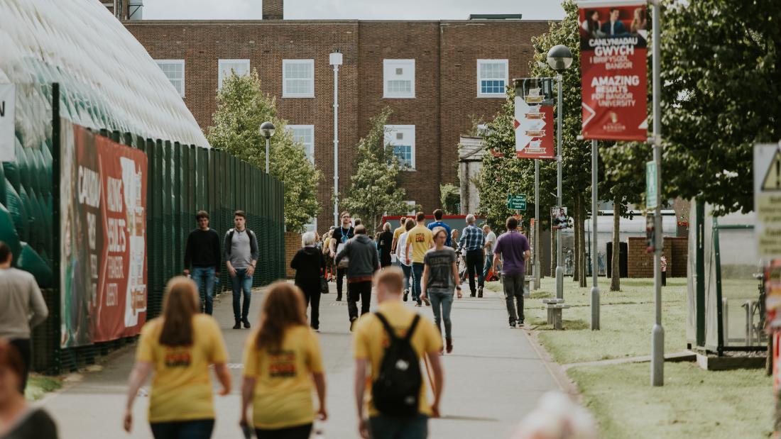 Peer Guides walking through the Ffriddoedd Student Village during Welcome Week