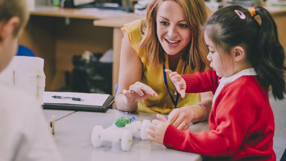 Teacher in a primary classroom.