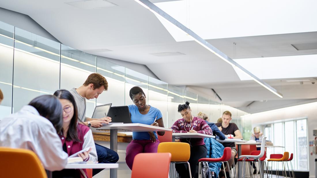 students working in social learning space