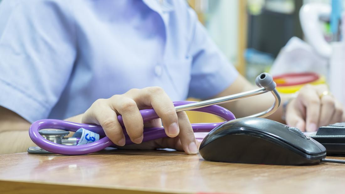 Nurse holding a stethoscope 