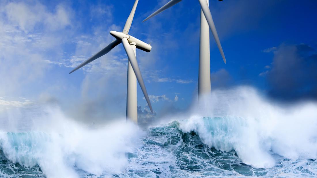 Wind turbines generating green energy at sea