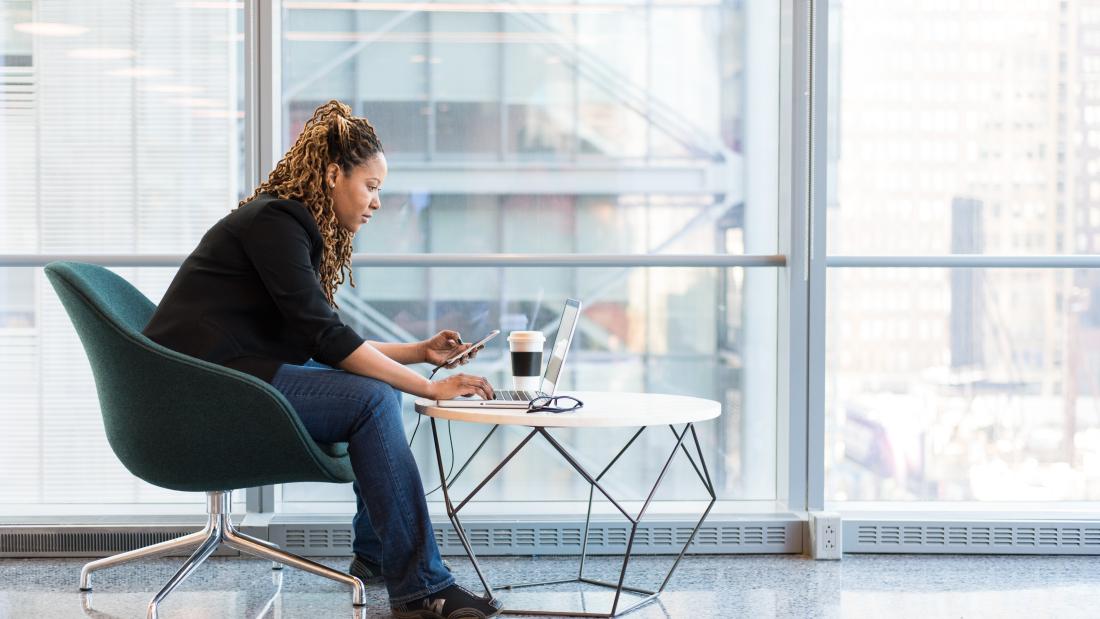 Woman working in social space 