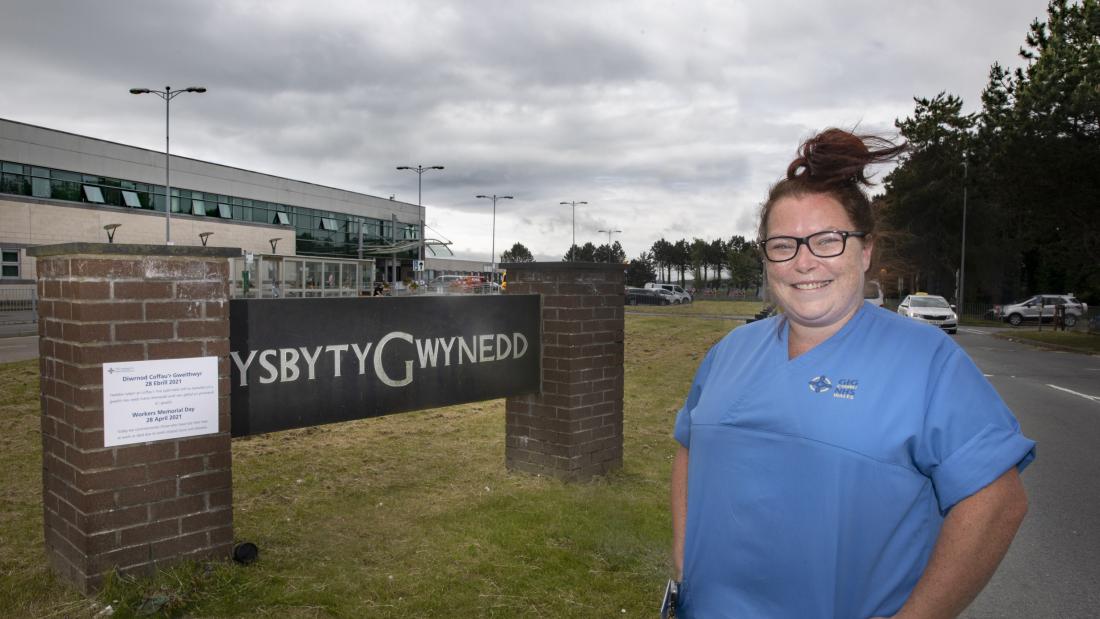 person standing near sign