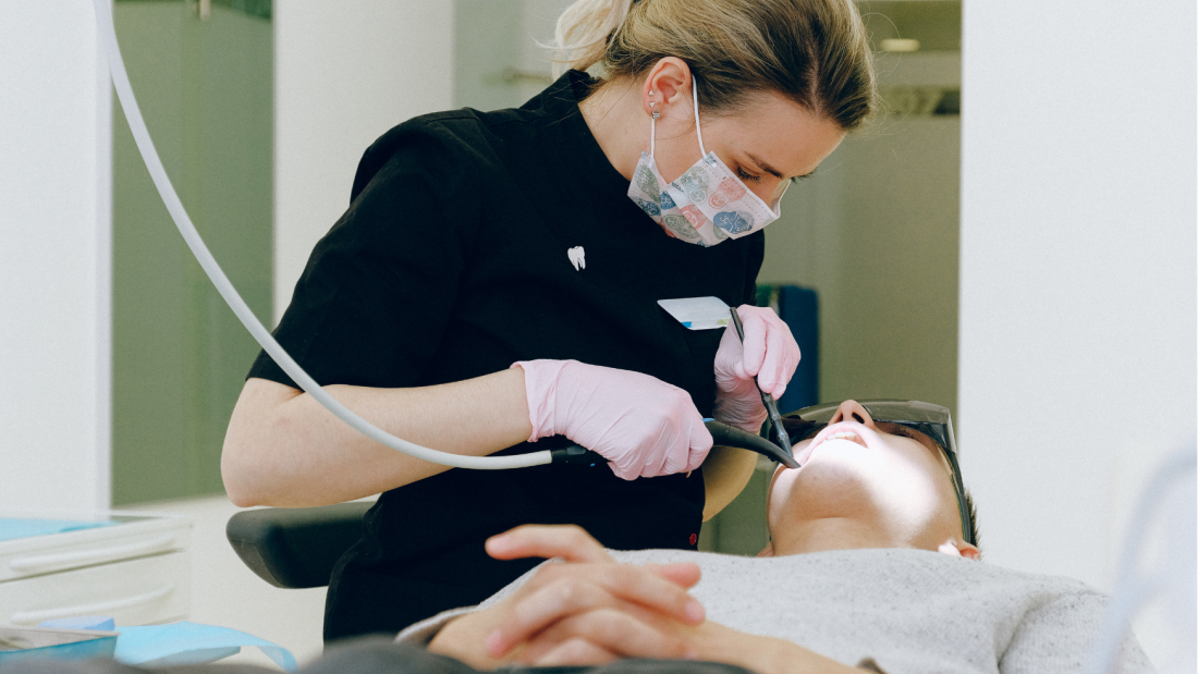 Dental check-up on patient