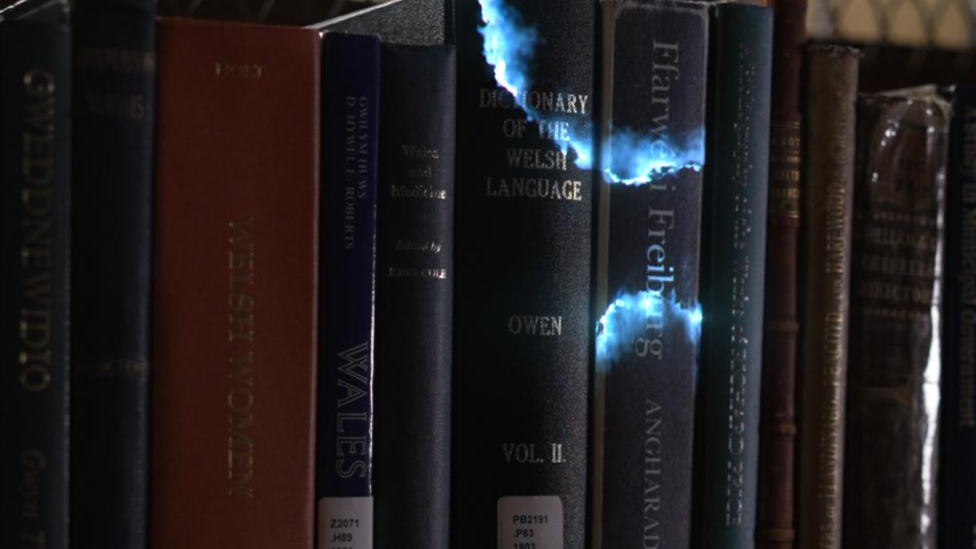 Close up of books in the library with magical sparkle effect