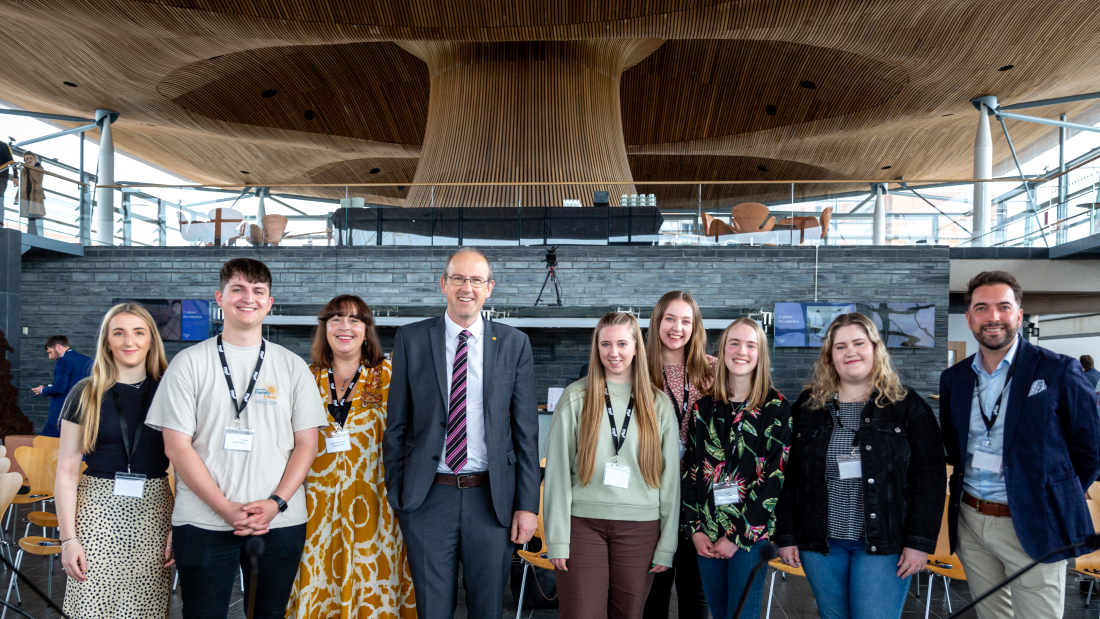 group of people in the Senedd building