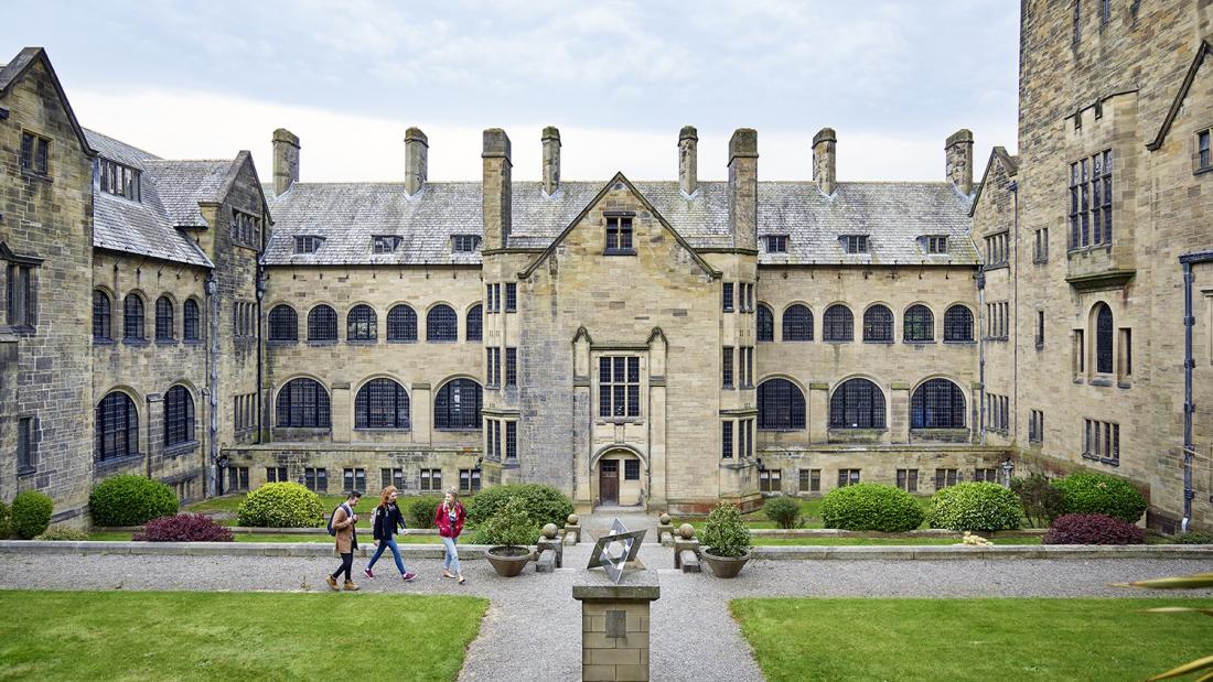 Main Arts inner quad with people walking across