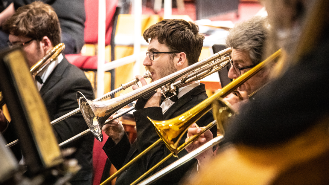 photo of someone playing a brass instrument