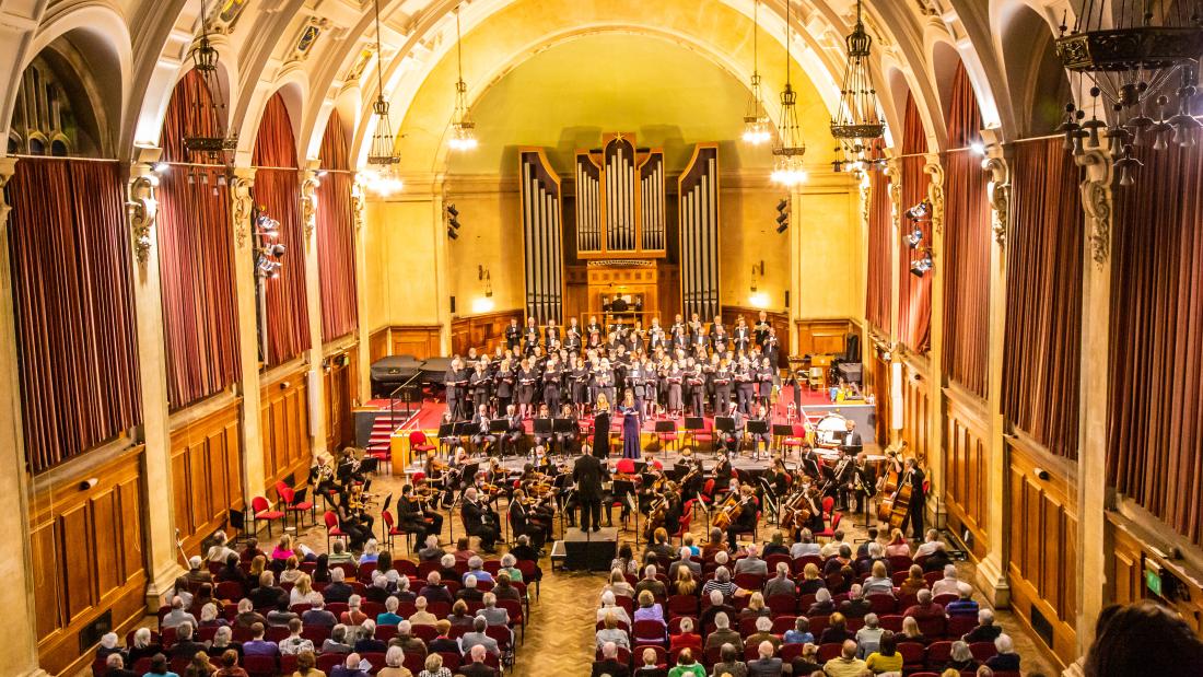 Concert hall with orchestra and audience