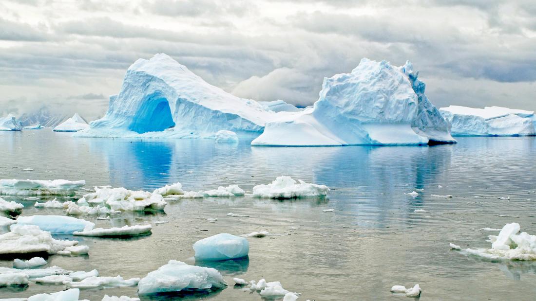 Iceberg in the Antarctic in the shape of an arch