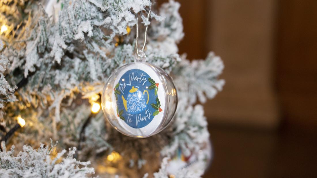 Christmas bauble on silver Christmas tree
