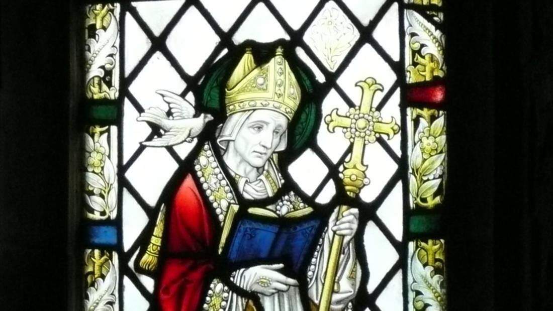 part of a stained glass window depicting St David