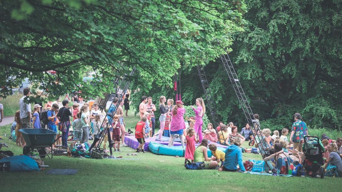 People in a festival in a field