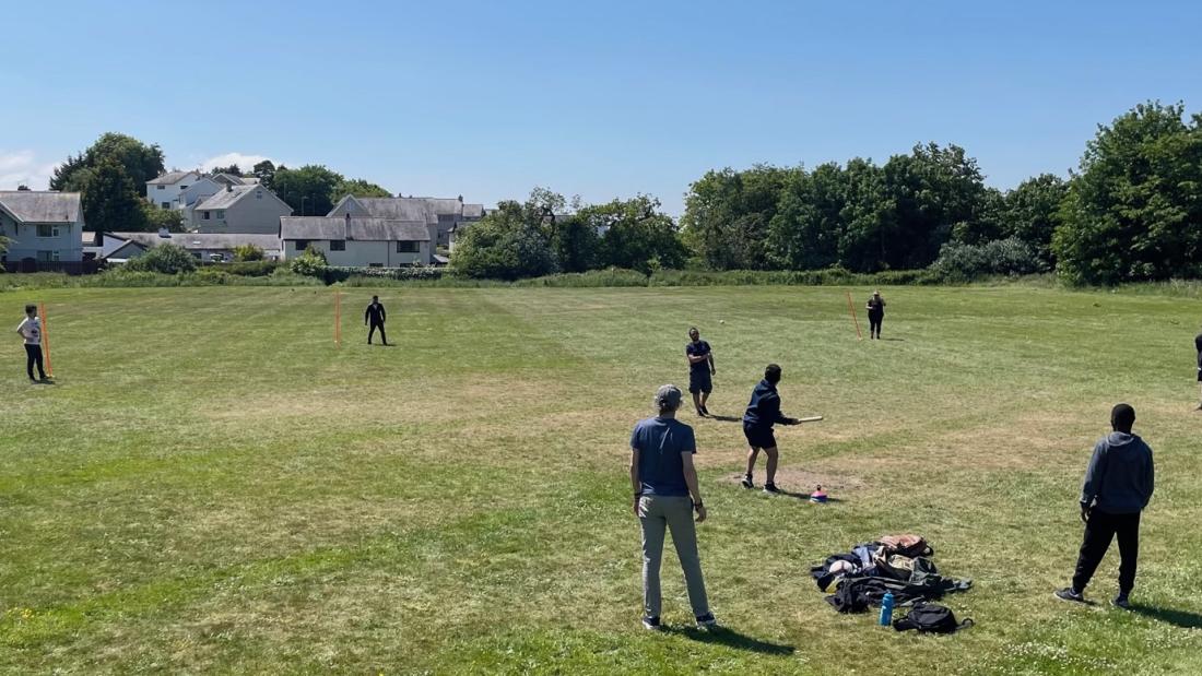 Staff and students at the School of computer Science and engineering playing rounders