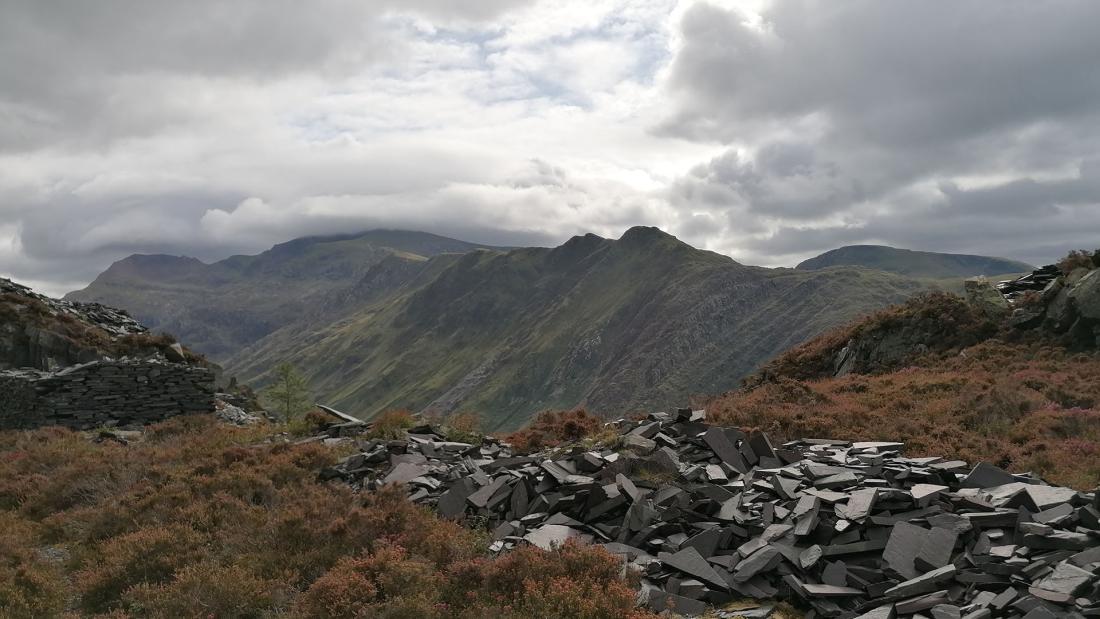 Image of Crib Goch mountain with clouds and slate