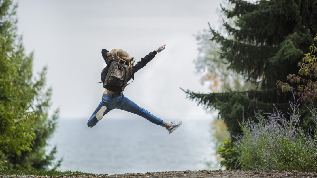 Woman jumping for joy