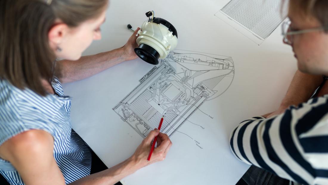Female Engineer Designing Equipment