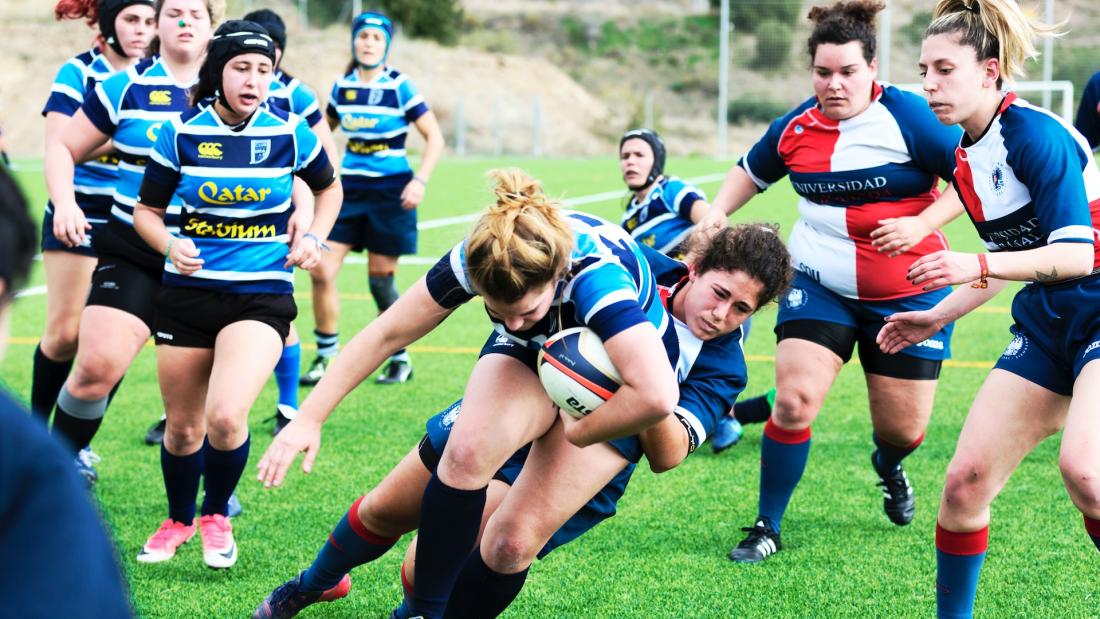 Female Rugby Players on the field.