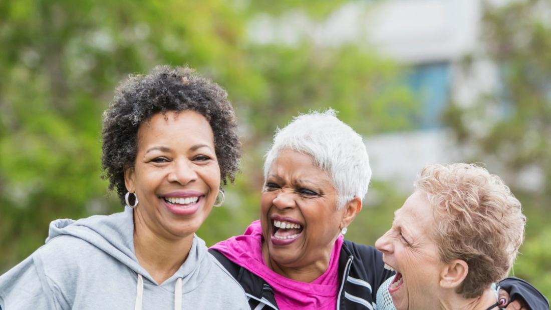 three women laughing