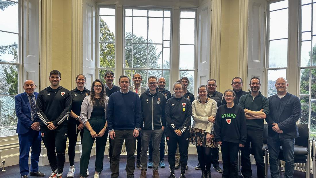 Group picture of students and members of the FAW team