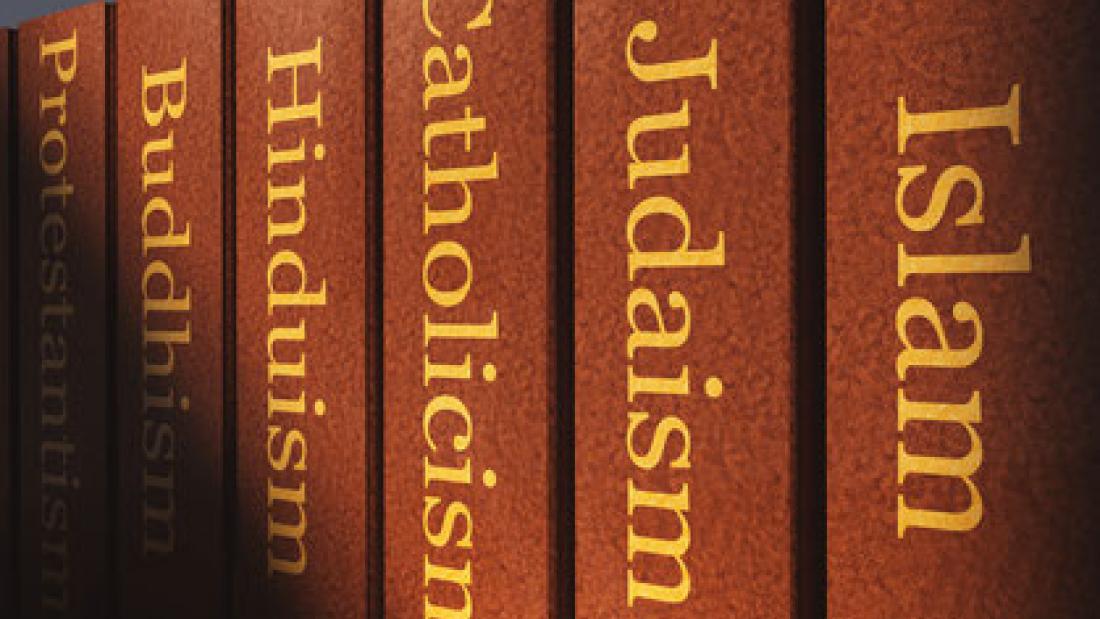Image of religious books with the titles Islam, Judaism, Catholicism, Hinduism, Buddhism