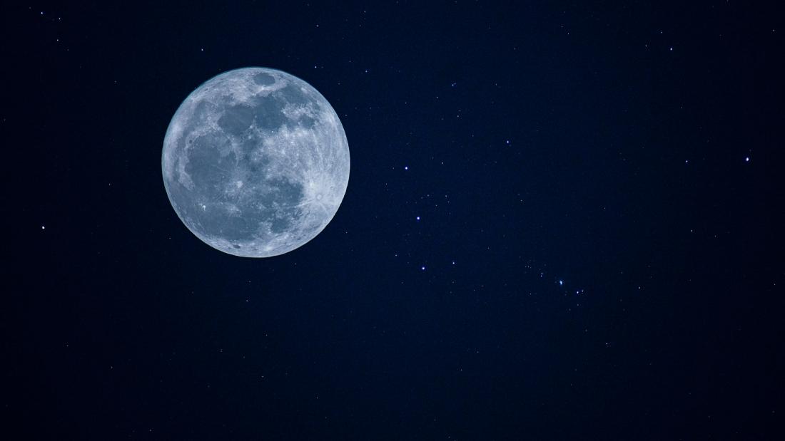 Picture of the moon and stars in the nights sky