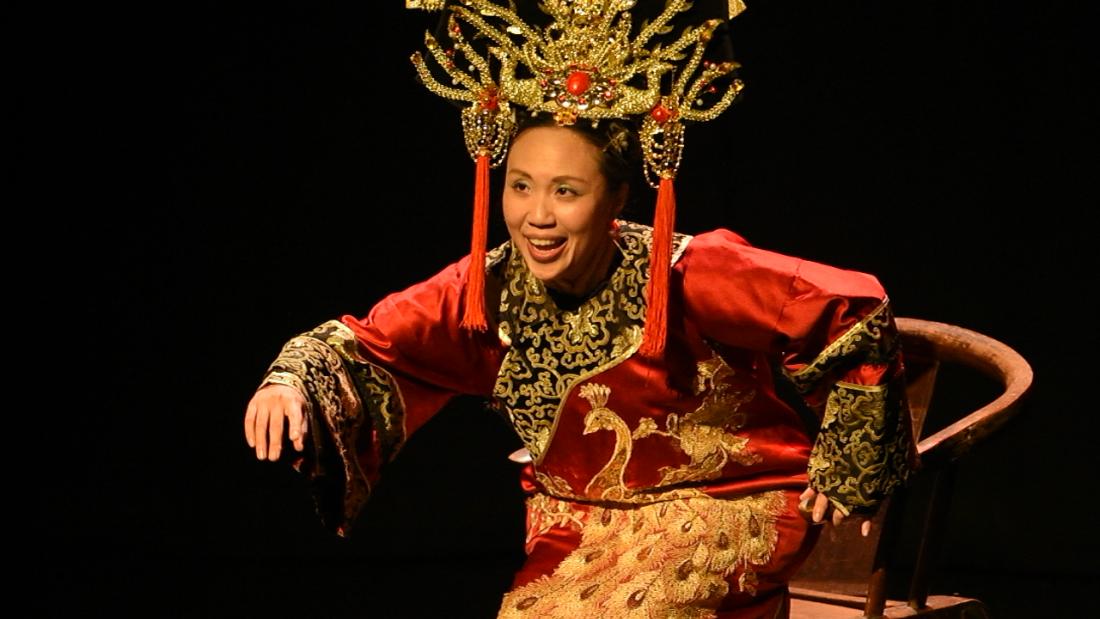 Chinese Empress sitting on a chair