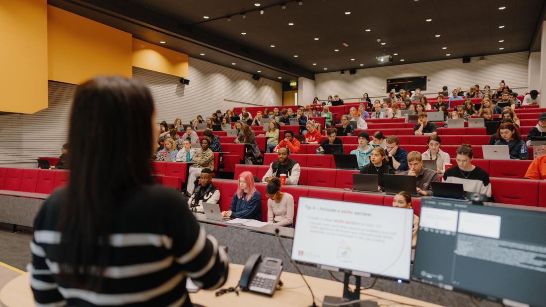 Students attending a lecture at Bangor University