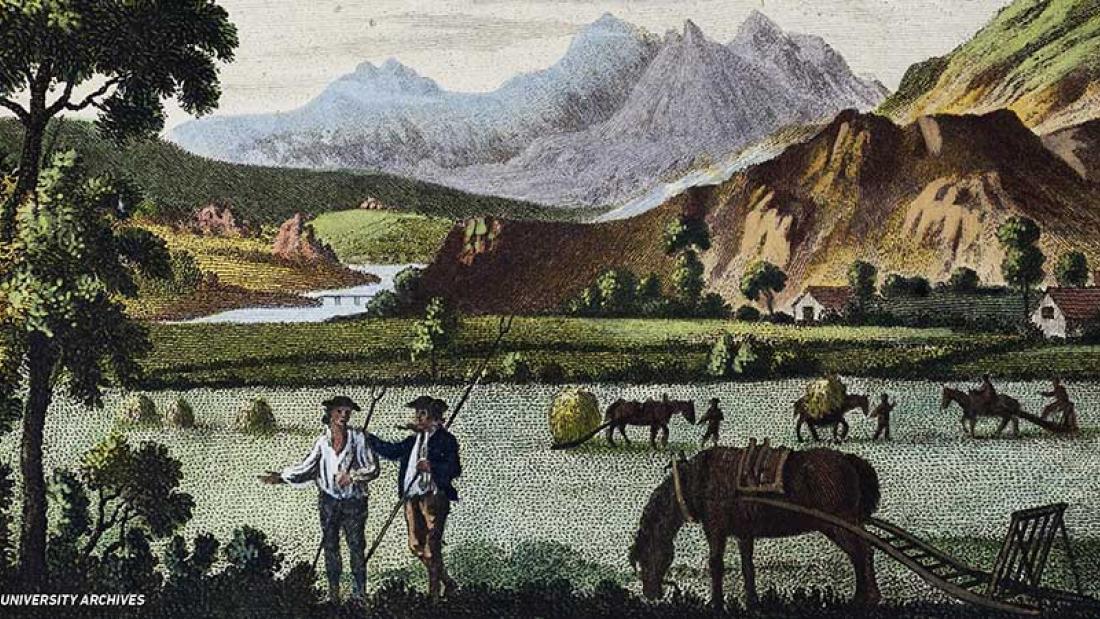 An agricultural scene with two figures in the foreground, lots of animals, and mountains in the background