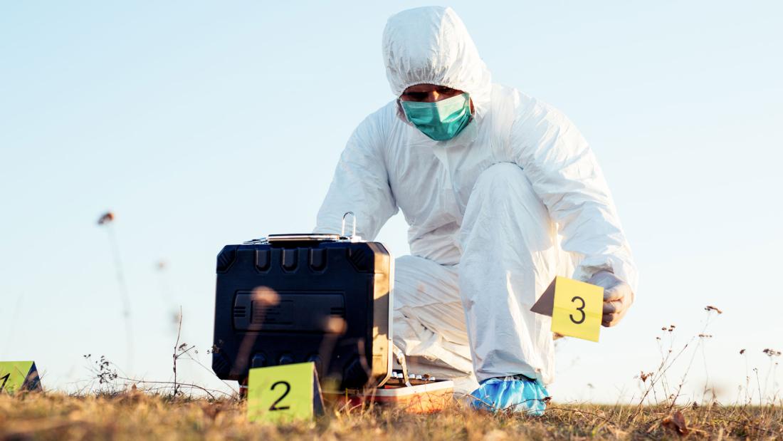 Forensic Scientist taking samples