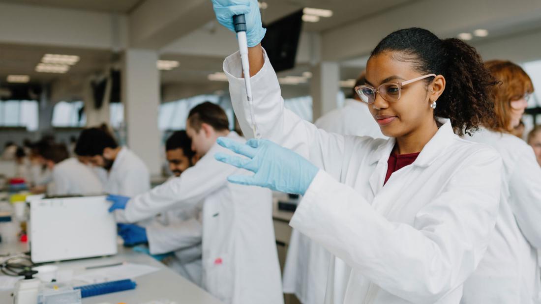 Biomedical Science Student working in a lab