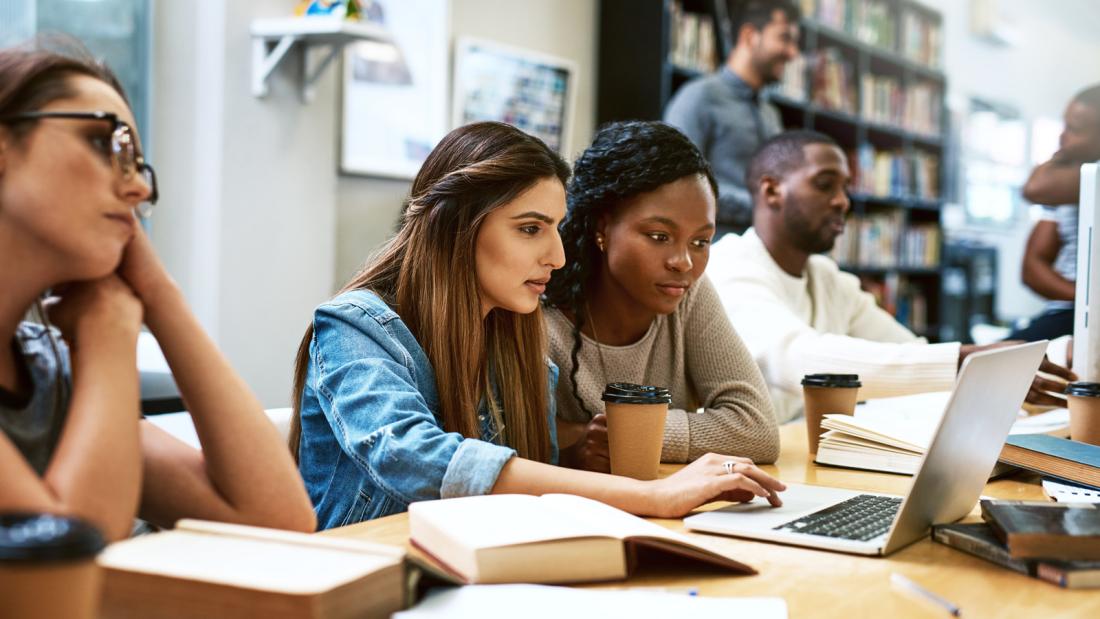 Sociology students on a laptop