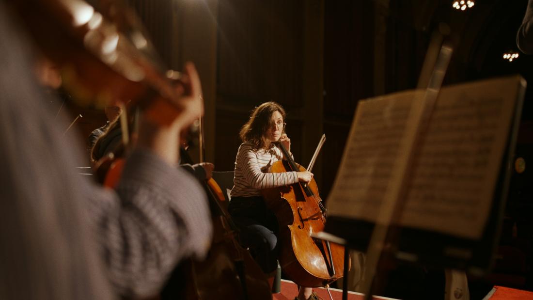 Student playing the cello