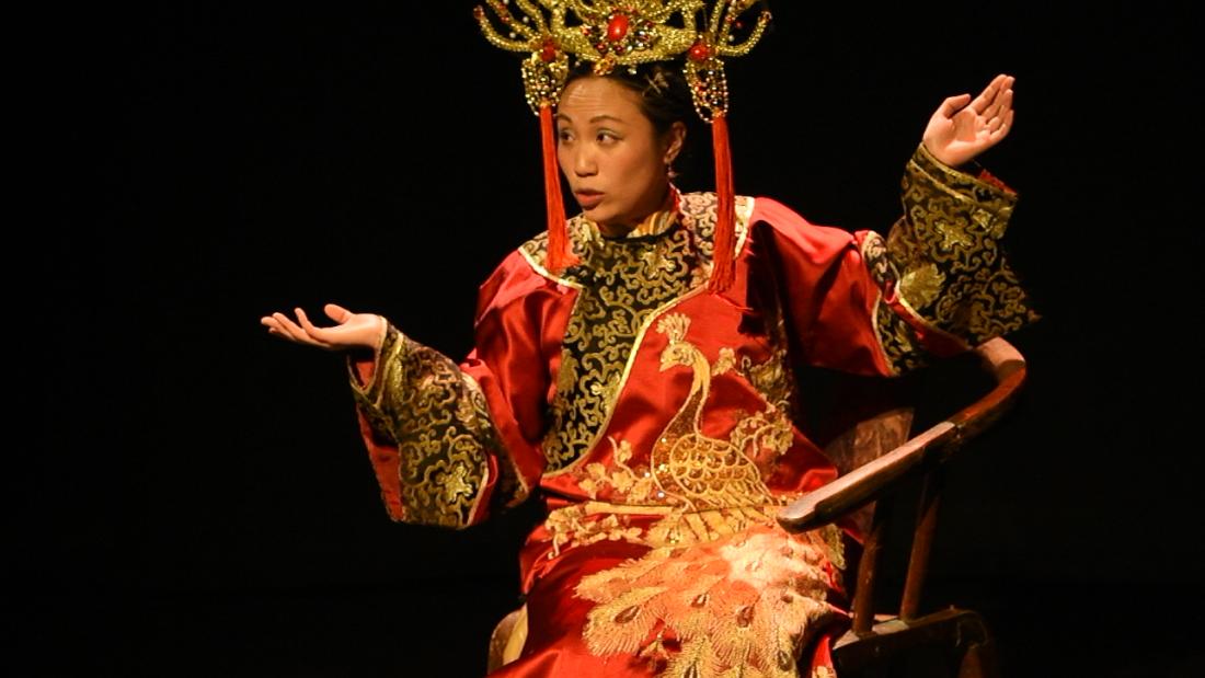 Chinese Empress sitting on a chair