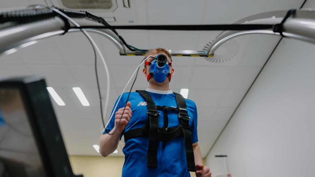 Student wearing Endurance Performance Testing gear in the lab at Bangor University