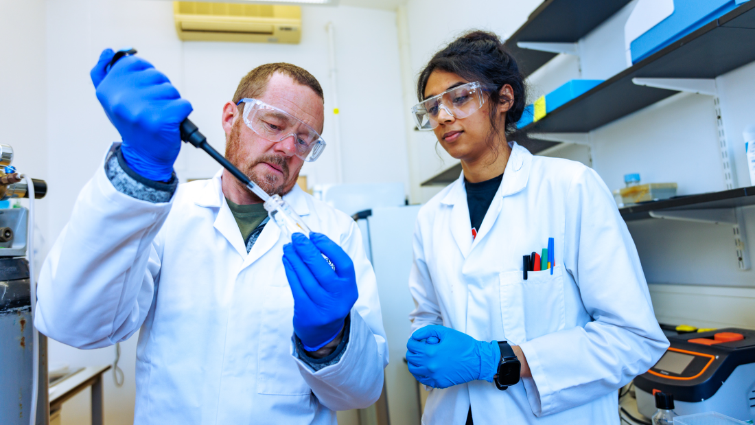 Prof Chris Gwenin and student Jessica Mahajan in the science labs at Abertay University, Dundee.