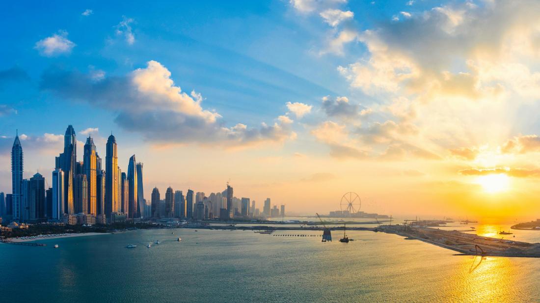 Cityscape with sunrise and blue sky