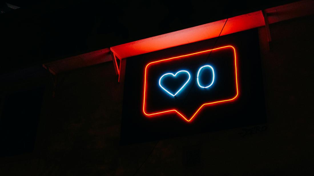 Neon light showing social media zero likes